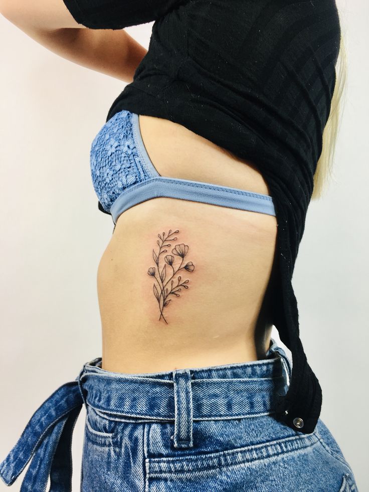 Rib cage wildflowers by @ellastormtattoo in 2022 | Rib tattoos for women, Tattoos for women flowers, Flower tattoo on ribs